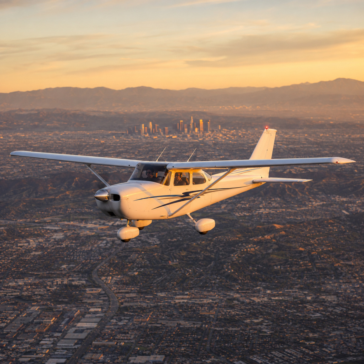 Cloud Aviation Cessna in flight over Los Angeles at golden hour